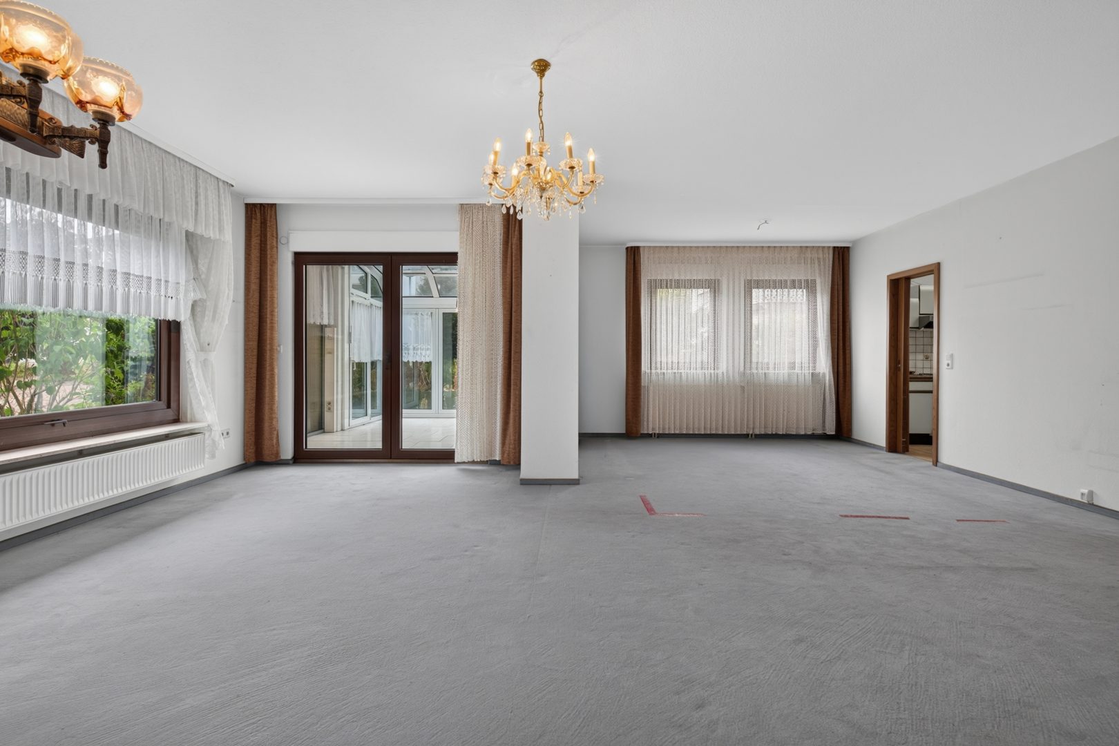 Wohn- Esszimmer mit Wintergarten
